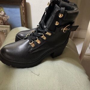 Black Leather Ankle Boots with Gold Accents